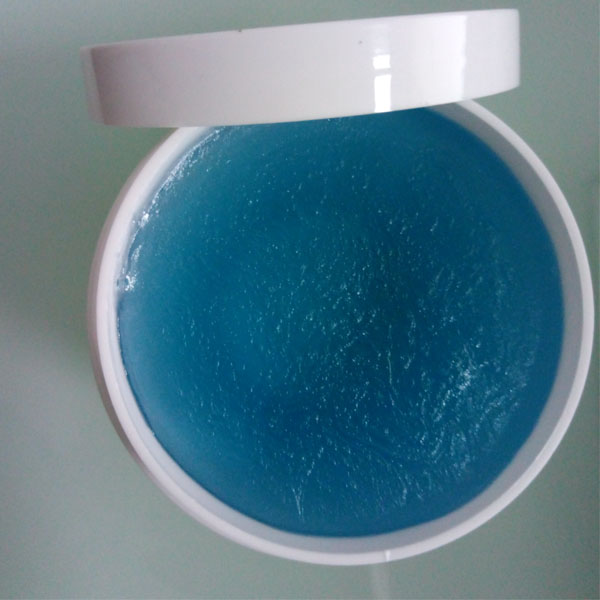 white plastic jar pomade wax